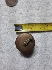 Antique fly fishing reel shaped tape measure