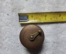 Antique fly fishing reel shaped tape measure