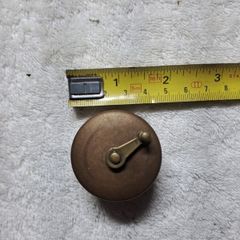 Antique fly fishing reel shaped tape measure