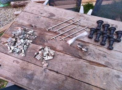 Assortment of cabinet hinges, handles, feet and fittings