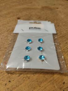 Pulse Accessories blue crystal stud earrings, featuring a round, faceted design. New with tags
