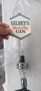Gilbeys London Dry Gin, wall bracket or shelf, new ,,buyer collects or pays postage thank you, see pictures for condition, sold as is,