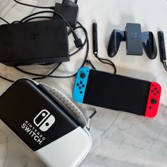 Nintendo Switch (with 2 games and accessories)