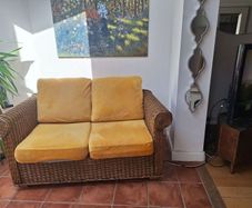 Conservatory wicker sofa