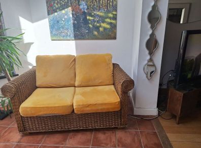 Conservatory wicker sofa