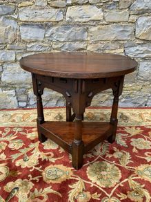 Early 20th Century solid oak gate leg drop leaf table.