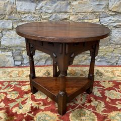 Early 20th Century solid oak gate leg drop leaf table.