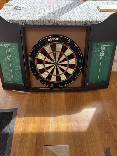 dart board and cabinet