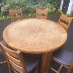 Large round solid timber table & chairs