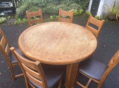 Large round solid timber table & chairs