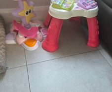 Girls toy activity table and ball tower.