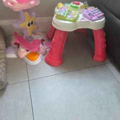 Girls toy activity table and ball tower.