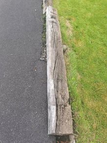 Weathered wooden railway sleeper