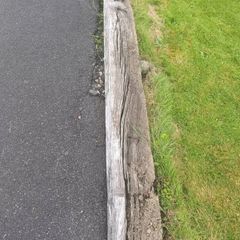 Weathered wooden railway sleeper