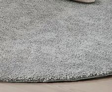 Round grey rug