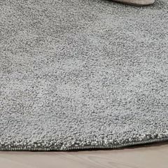 Round grey rug