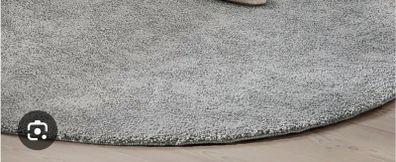 Round grey rug