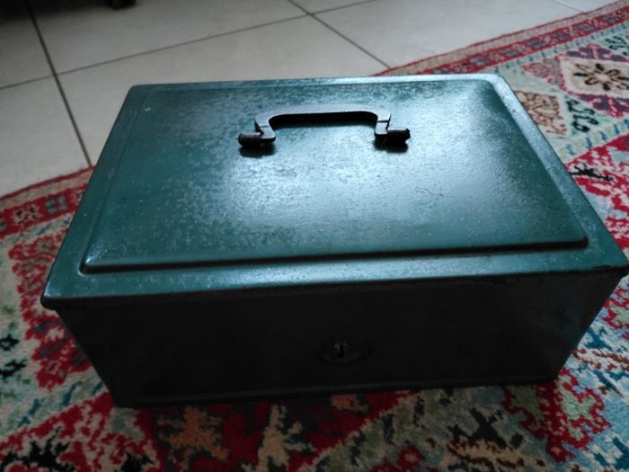 Vintage green metal cash box with key