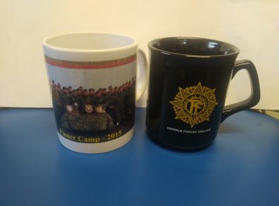 Two Irish Defence Forces mugs