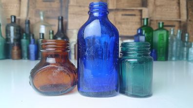 454 - Set of Three Beautiful Vintage Glass Decorative Collectible Bottles - Amber Eire Bovril, Cobalt Blue Magnesia and Turquoise Science Cream