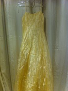 Pale lemon bridesmaids dress or debs gown with shawl.