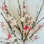 artificial cherry blossom stems in a glass vase Image 2