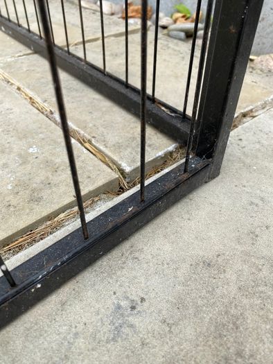 Black metal dog pen