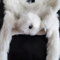 New white fur hat tag attached