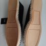 new flat black shoes with a little sparkle tag attached Image 3