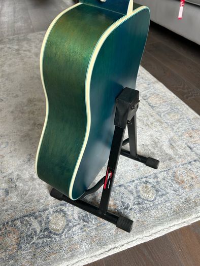 Acoustic guitar with strap, bag, stand and accessories
