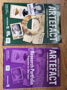 Artefact. Junior cert history book and portfolio.