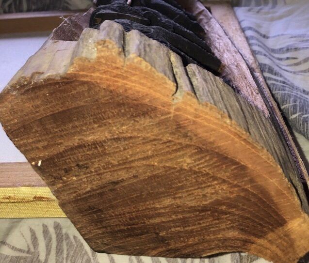 Hand carved wood.