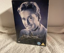 Errol Flynn the signature collection all new and sealed except for dive bomber