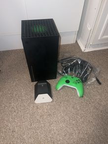 Xbox series x, 2 controllers and rechargeable battery pack& charger stand