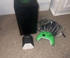 Xbox series x, 2 controllers and rechargeable battery pack& charger stand