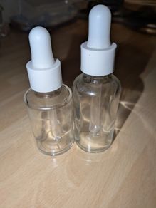Small glass dropper bottles