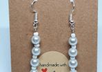 White pearl earrings