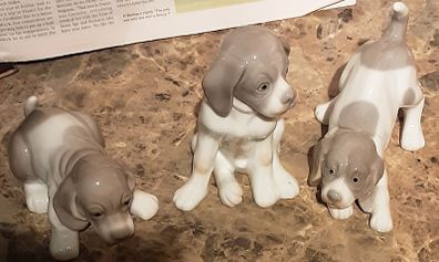 nice ceramic puppies, read ad