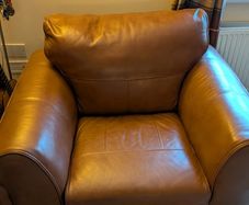Genuine Leather sofa and matching armchair Free Delivery