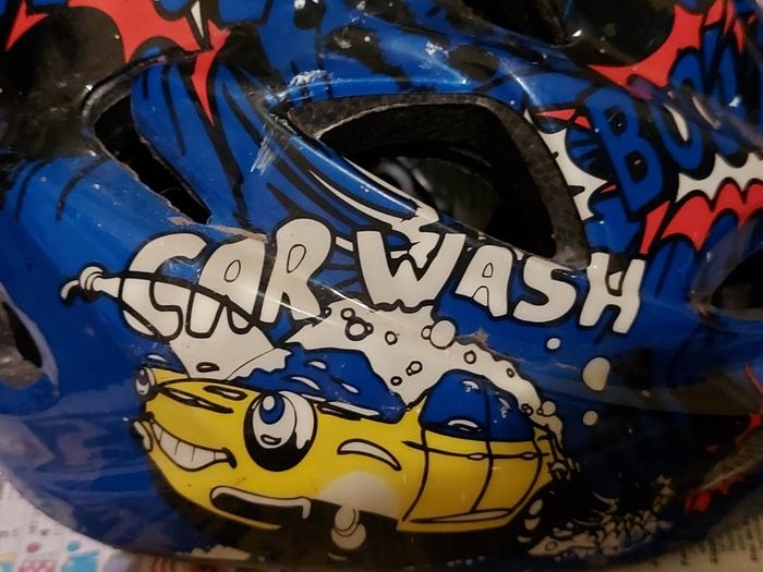 2 Childrens Safety Cycle Helmets, Car Wash & Batman, in very good condition