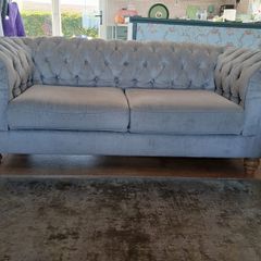 Grey fabric chesterfield sofa