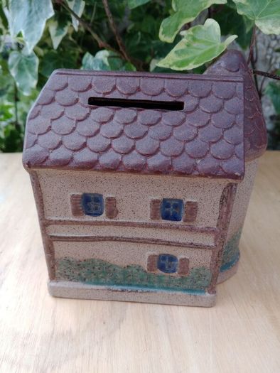 Miniature house, piggy bank, money box, savings box