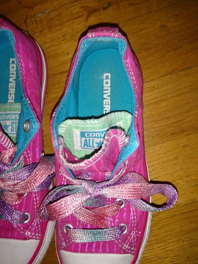 Pink Converse all stars
