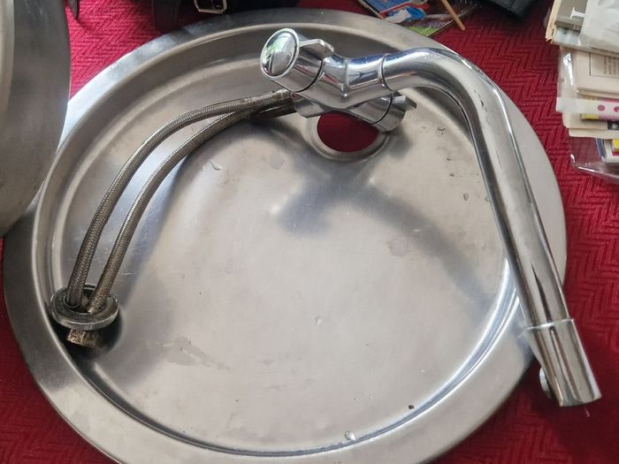Round sink and tap