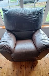 Brown leather recliner.