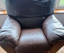 Brown leather recliner.