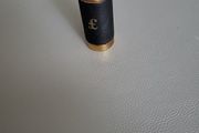 One pound coin container