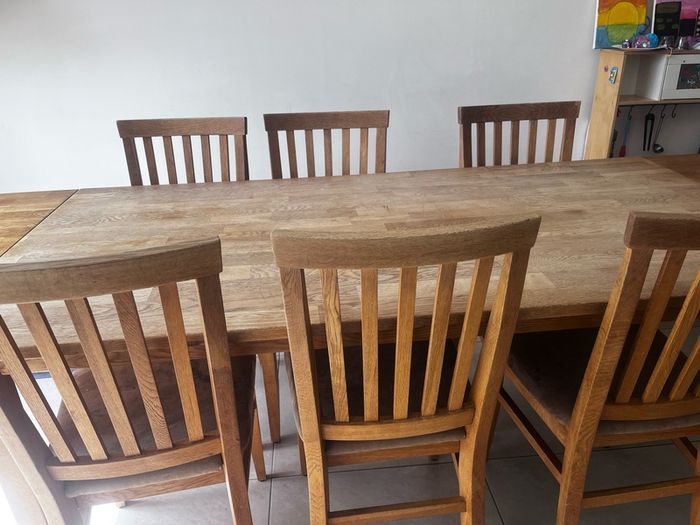Solid oak dining table and chairs
