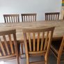 Solid oak dining table and chairs Image 4