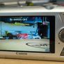 Canon IXUS 1000 HS Digital Camera (High Sensitivity 10 Megapixel, 10x Zoom, 3.0 inch LCD Screen) - Grey Image 9